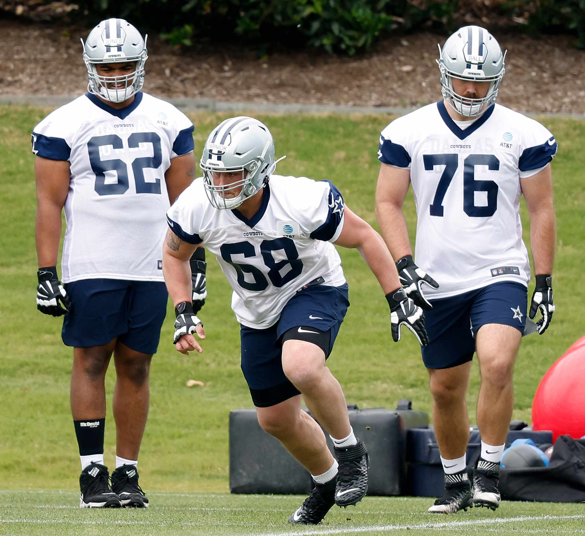 Dallas Cowboys rookie guard Matt Farniok (68) runs through drills at rookie minicamp at the...