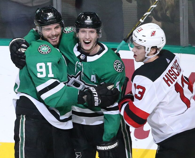 Dallas Stars Tyler Seguin (91) and John Klingberg (3) celebrate Seguin's goal in the second...