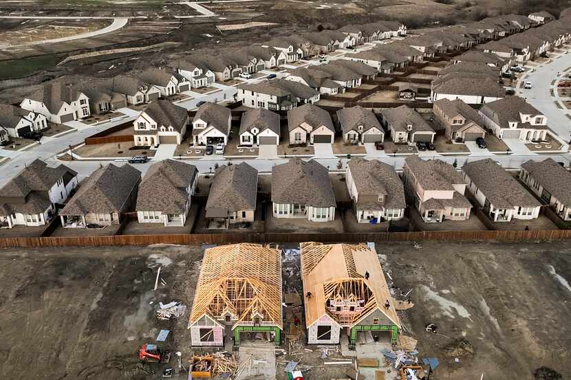 Aerial view of homes under construction in the Devonshire subdivision in Forney.