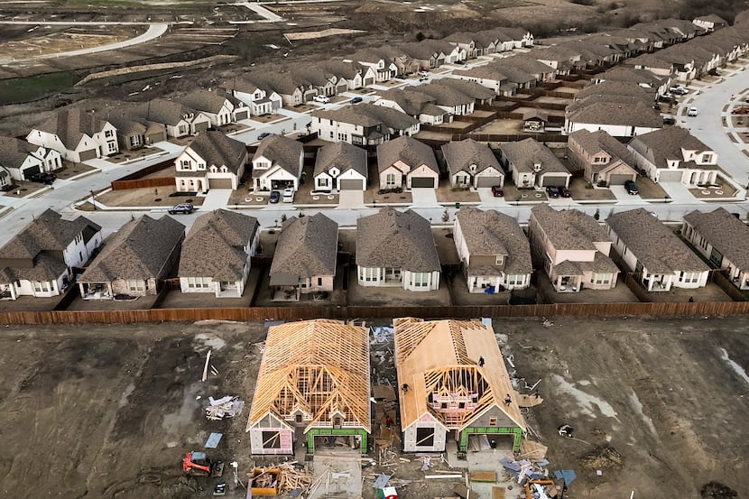 Aerial view of homes under construction in the Devonshire subdivision on Thursday, Feb. 9,...