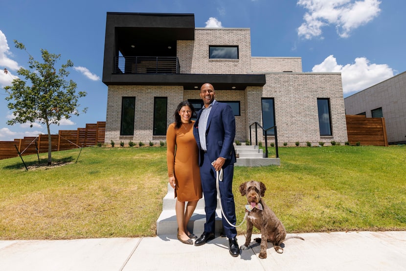 Priya Vithani (left) pictured with her husband Irman Vithani and their dog Winston outside...