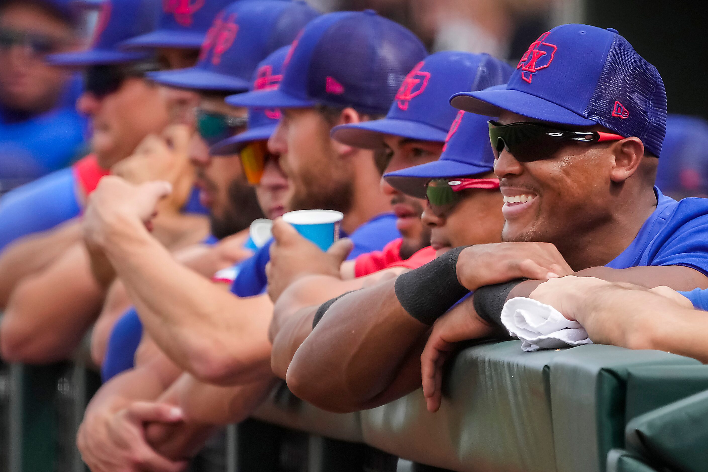 Former Texas Rangers third baseman Adrian Beltre (right) watches from the dugout with son...