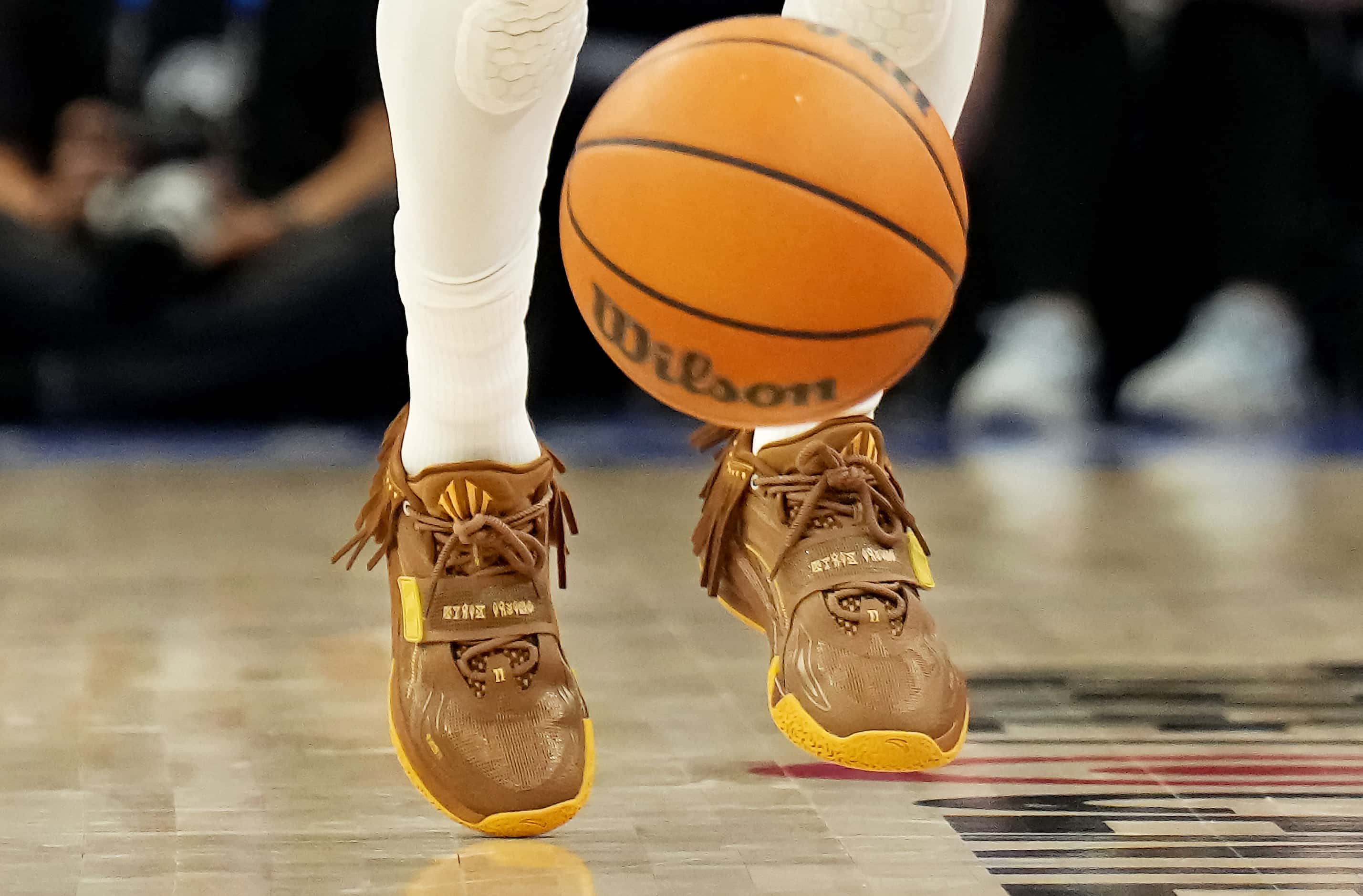 Dallas Mavericks guard Kyrie Irving’s shoes are seen as he brings the ball up the courth...