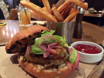 Water Grill's menu in California includes some dressed-down dishes like this crabcake burger.