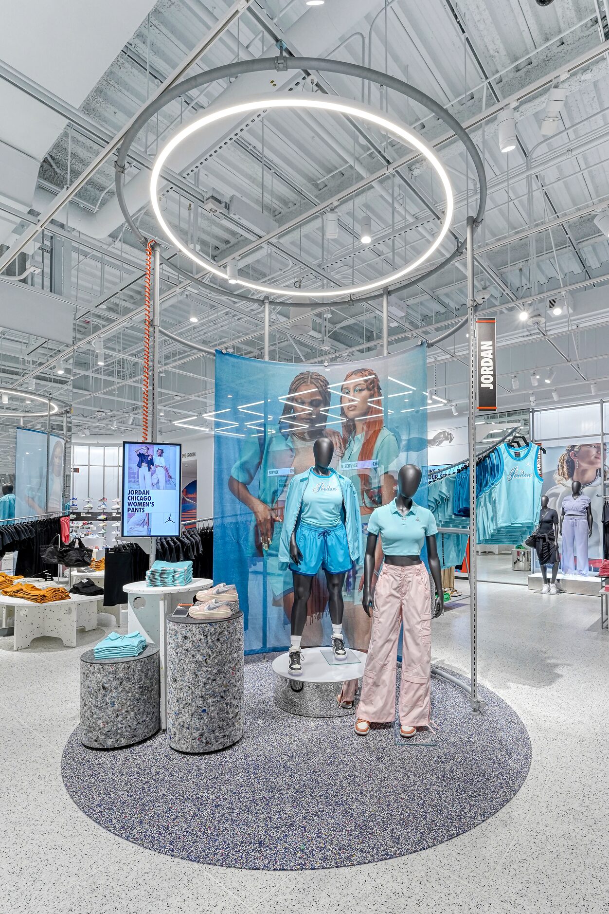 Women's display in the Nike Rise store at NorthPark Center.
                               