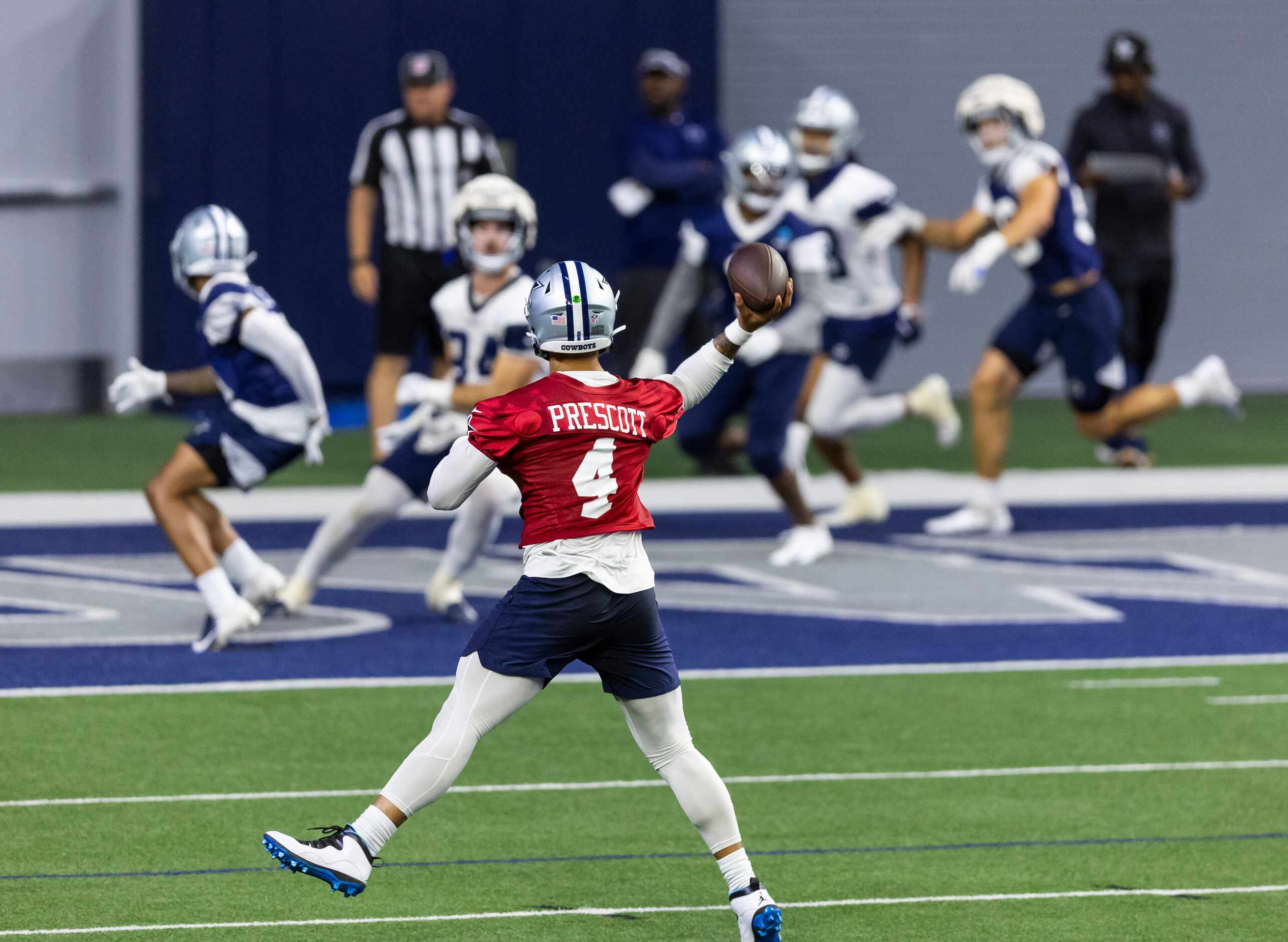 Dallas Cowboys quarterback Dak Prescott throws during a minicamp practice at The Star in...