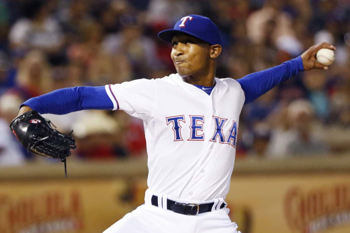 Texas Rangers relief pitcher Sam Freeman (71) delivers a pitch to Houston Astros first...