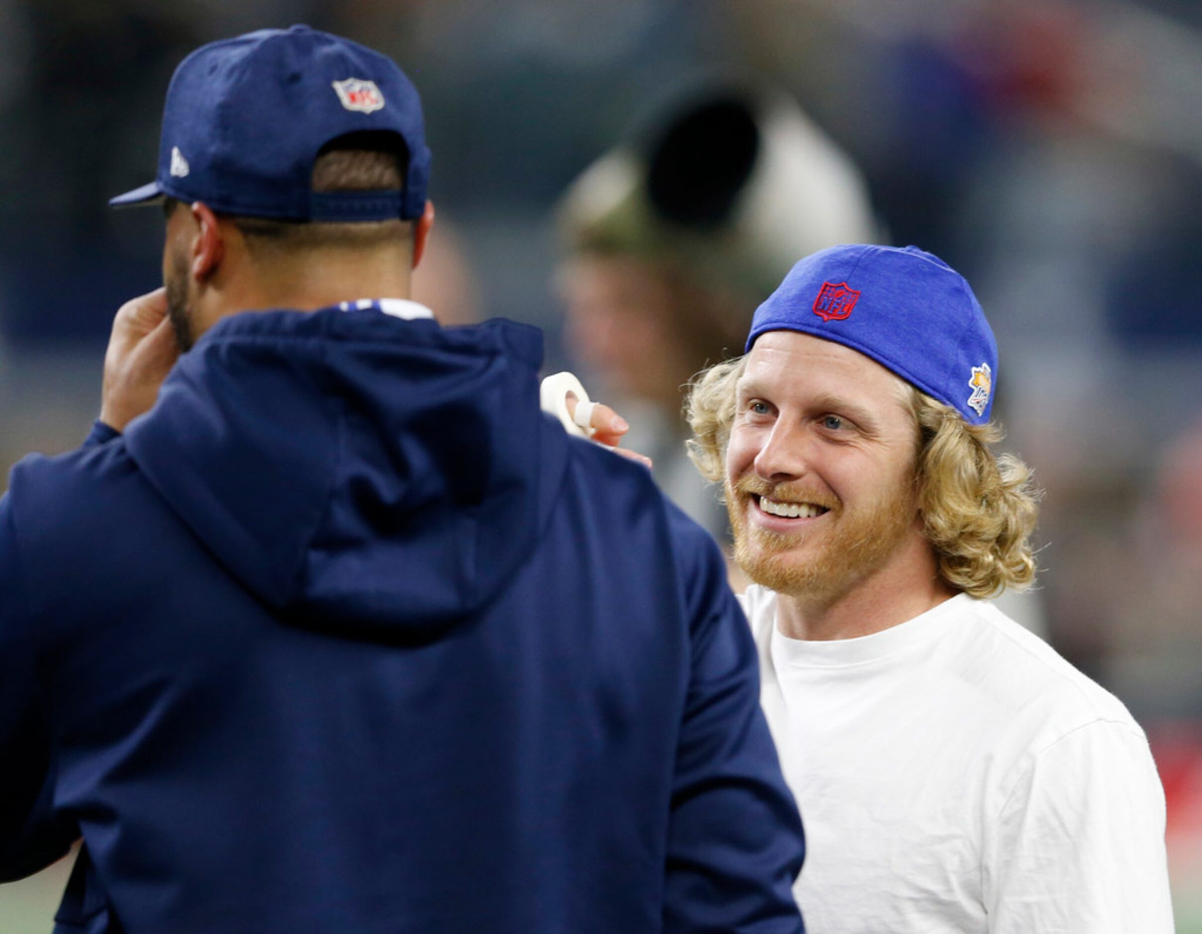 Buffalo Bills wide receiver Cole Beasley (10) talks with Dallas Cowboys quarterback Dak...