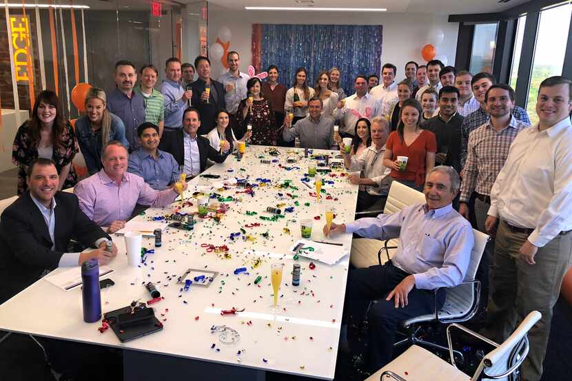 Edge Realty Partners workers are shown celebrating the company's 10-year anniversary in 2019.