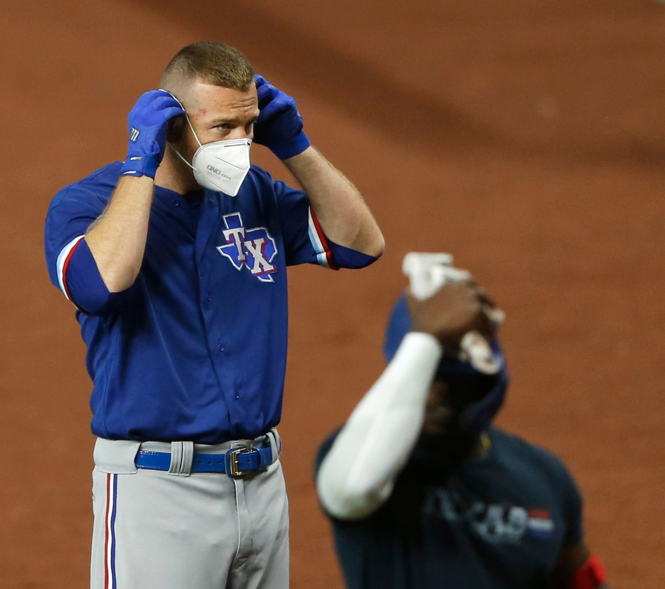 Texas Rangers Todd Frazier (21) adjusts his mask during Texas Rangers 2020 Summer Camp at...