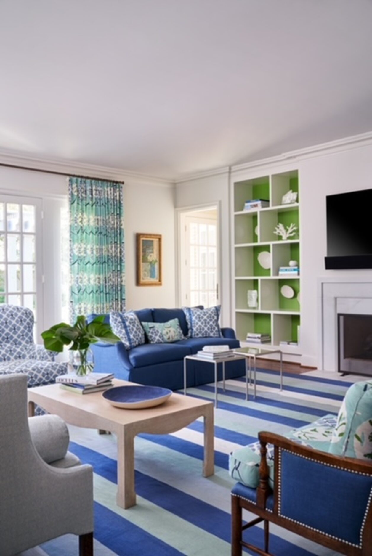 Bookshelves in blue room