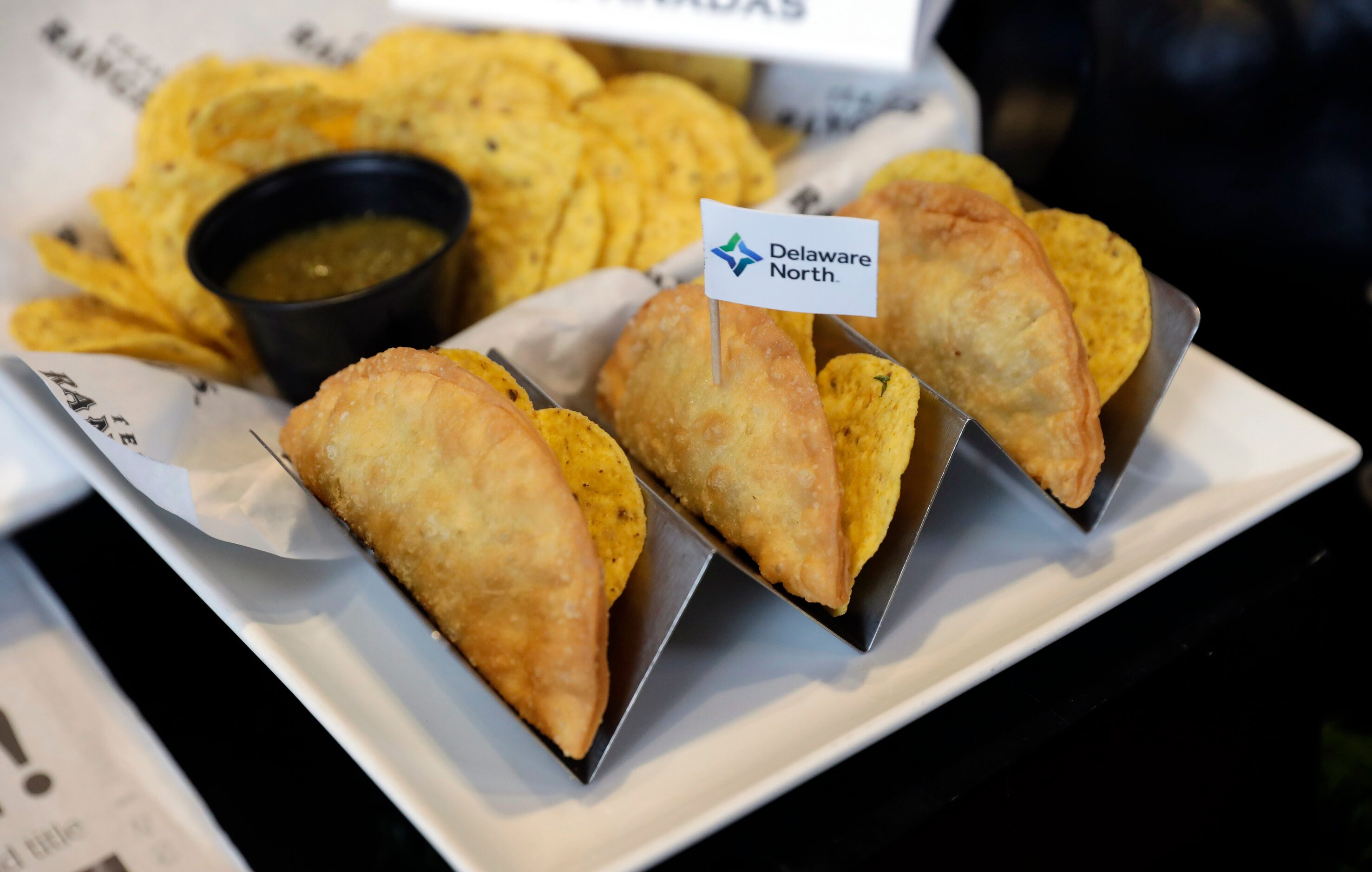 The Texas Rangers unveiled Chicken Empanadas, a menu item for the 2024 season at Globe Life...