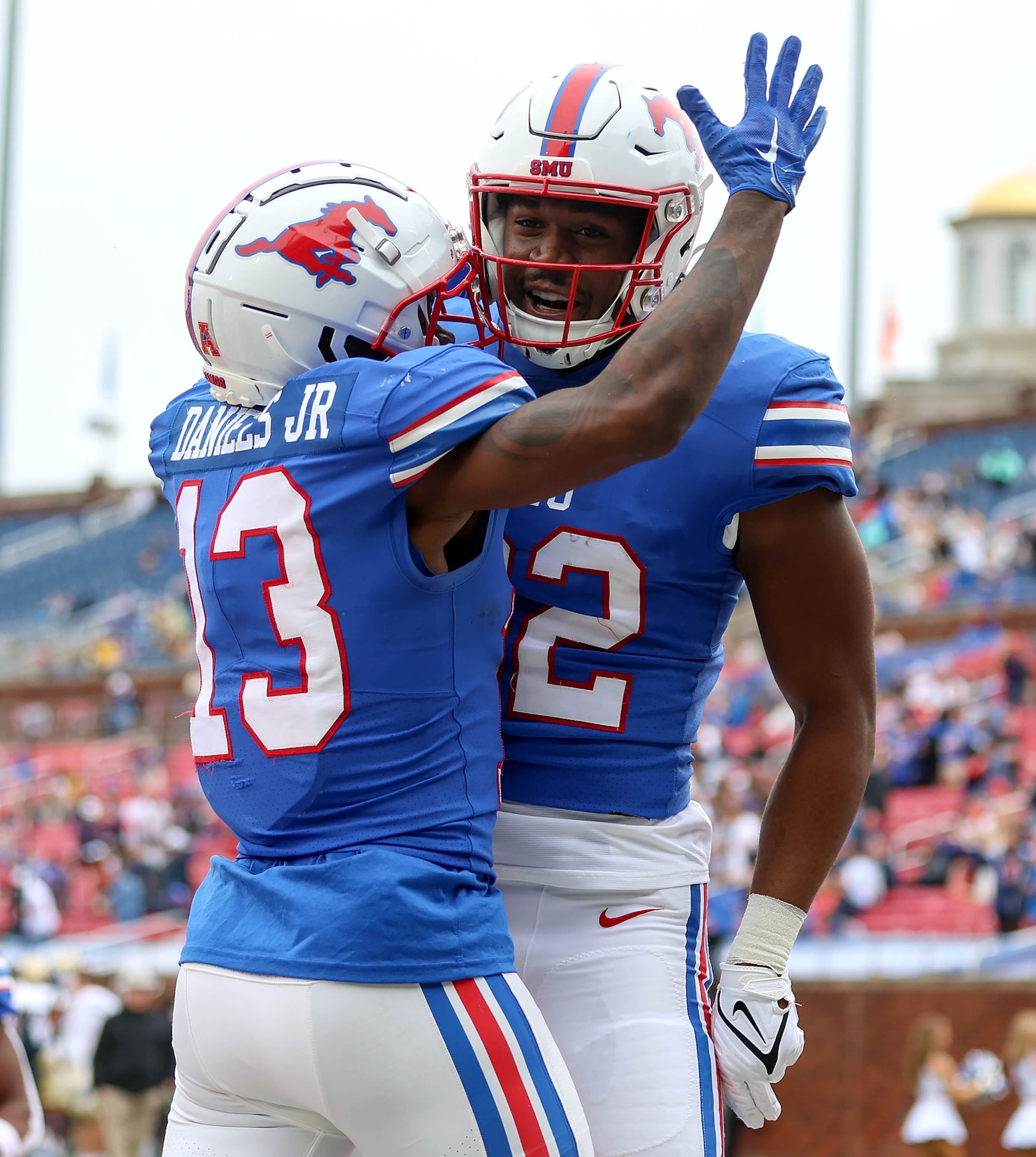 SMU wide receiver Roderick Daniels Jr (13) and tight end RJ Maryland (82) celebrate after...