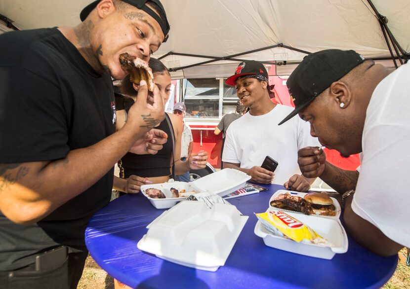 From left, Mark Noble, Paisley Rodriguez, King Noble and Finesse Walker, all of Houston, eat...