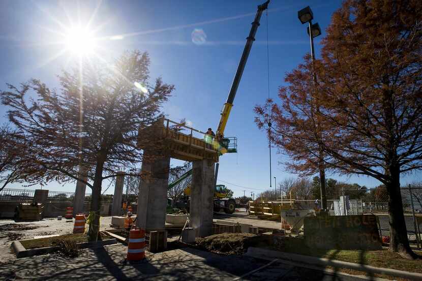 
Construction has begun on a pedestrian bridge that will span East Abram Street at the...