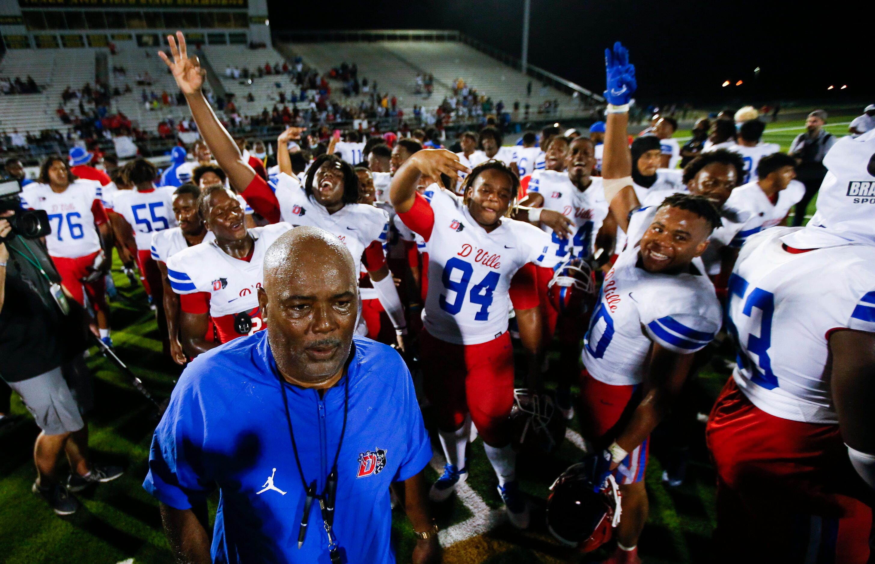 Duncanville celebrates a 42-21 win over DeSoto after a high school football game at DeSoto...