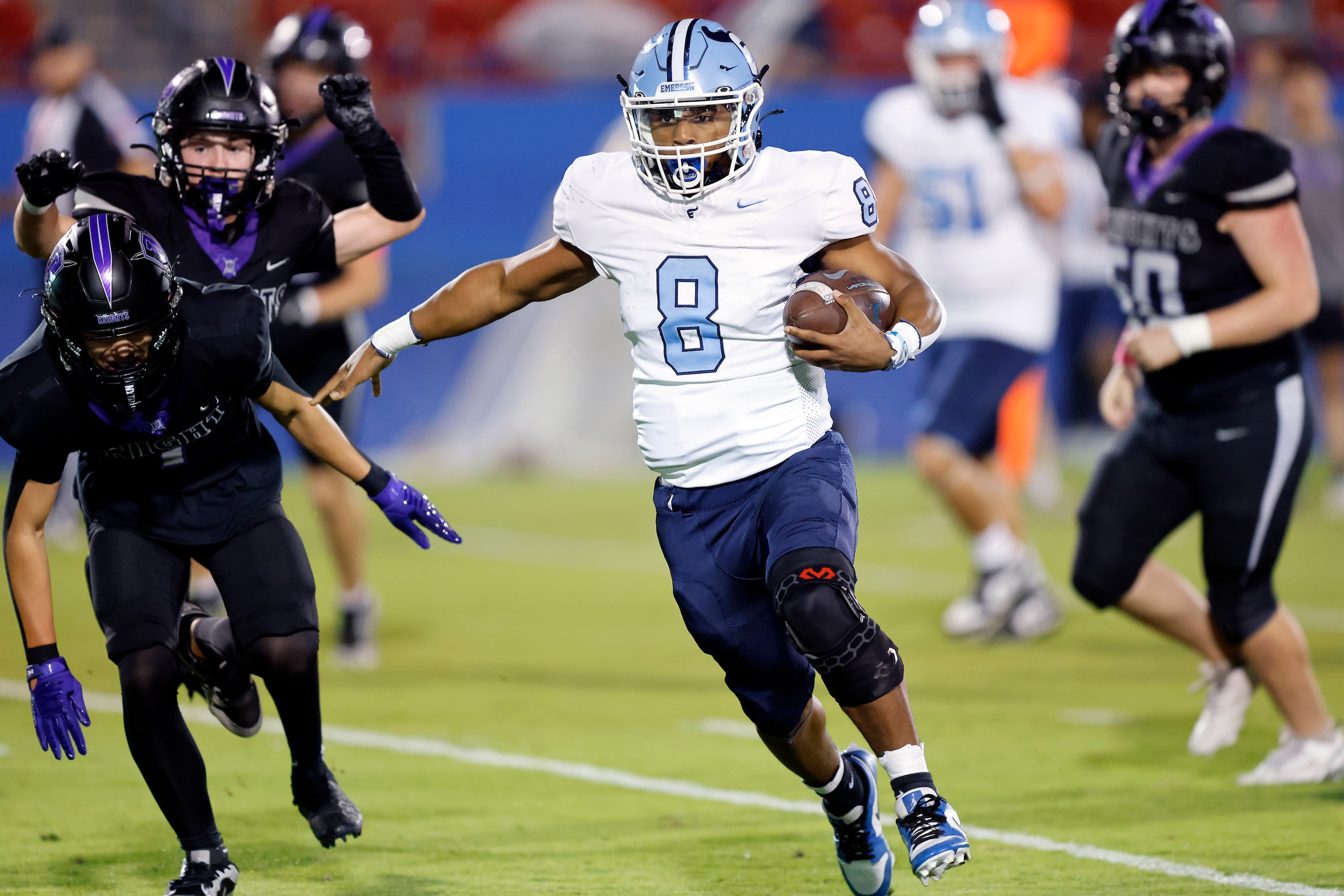 Frisco Emerson running back Kameron Lockhart (8) carries the ball for a second quarter run...