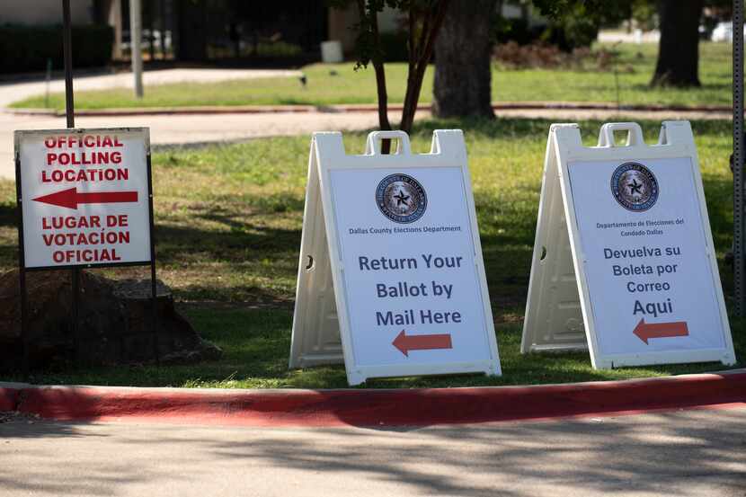 In this file photo, signage to vote at a polling location outside of the Dallas County...