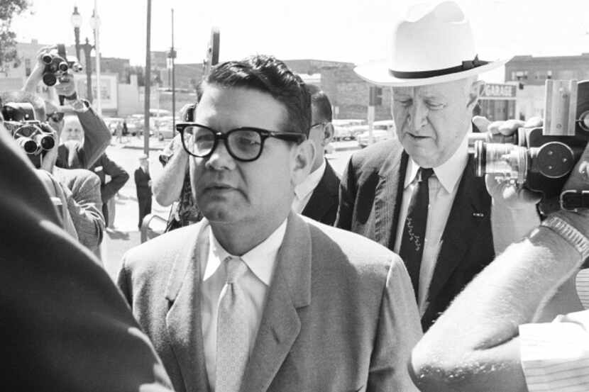 Billie Sol Estes arrives in May 1962 at the federal courthouse in El Paso, accompanied by...