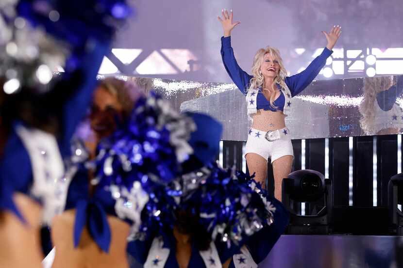 Country singer Dolly Parton performs during half-time of the Thanksgiving Day football game...