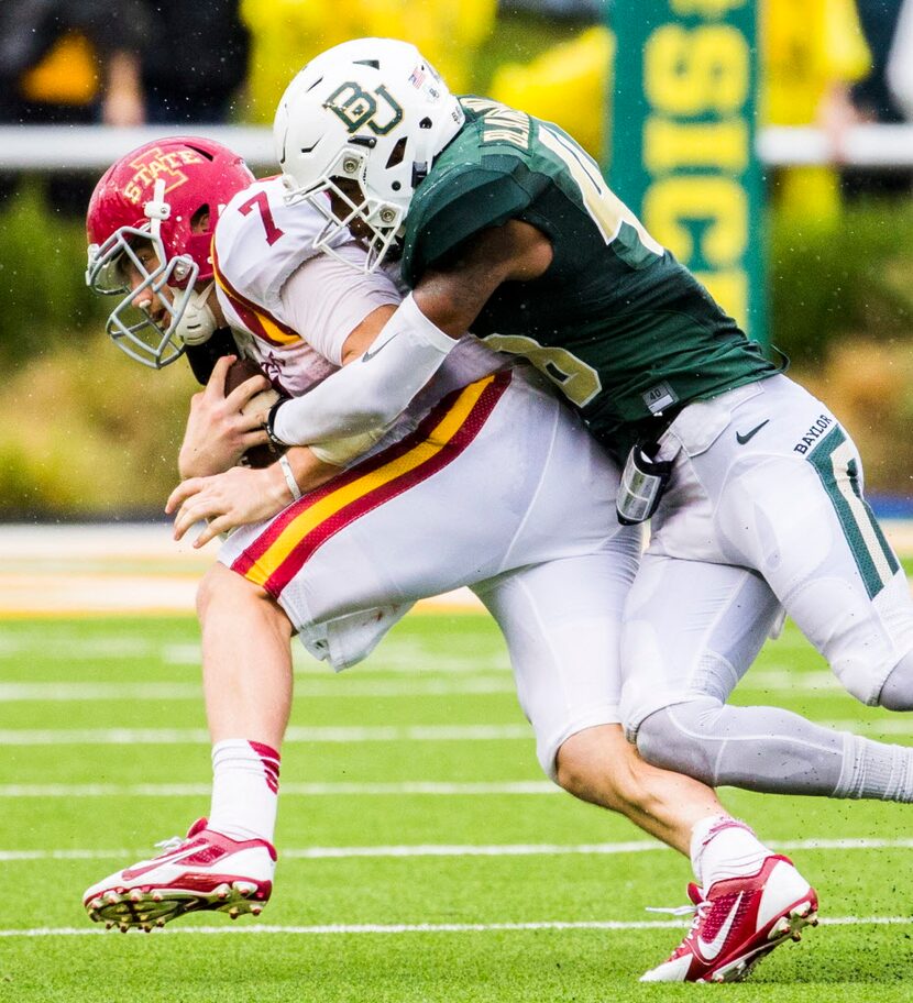 Baylor Bears running back Travon Blanchard (48) tackles Iowa State Cyclones quarterback Joel...