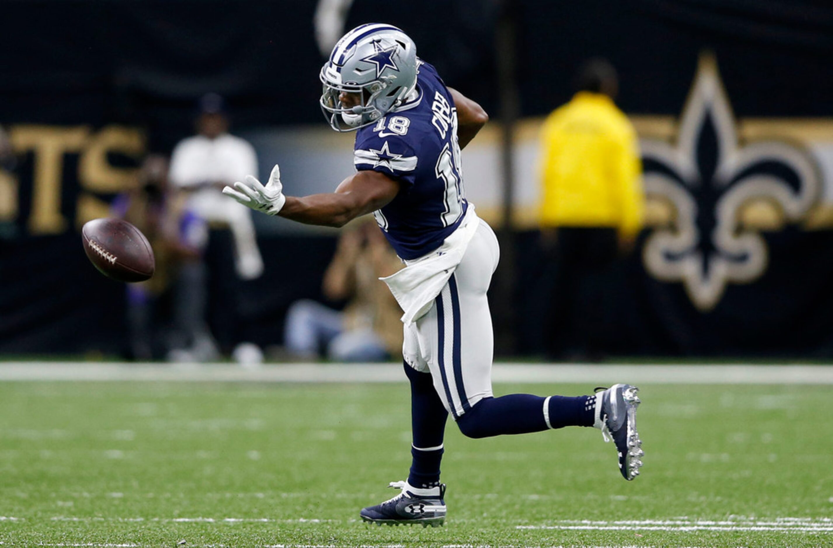 Dallas Cowboys wide receiver Randall Cobb (18) bobbles a pass during the second half of play...