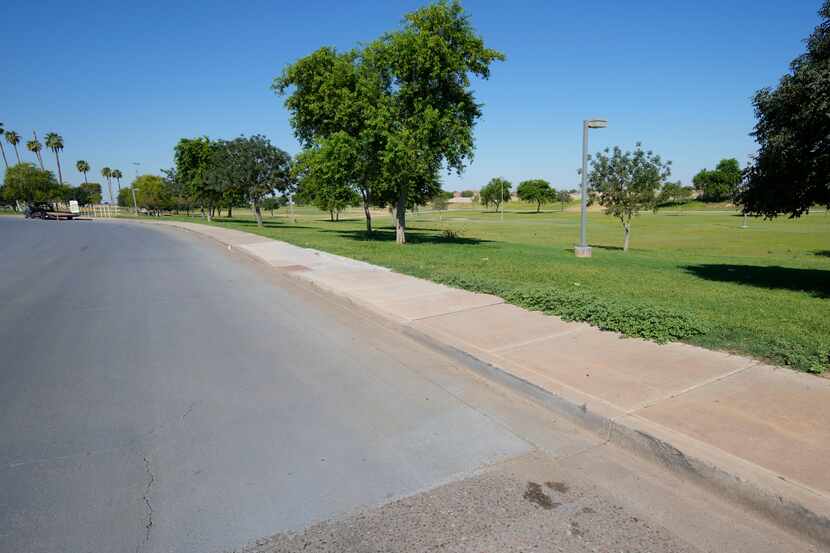 CoolSeal is seen on September 16, 2022., Cool pavement is a special coating for asphalt (not...