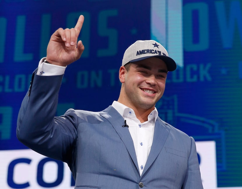 Offensive lineman Connor Williams faces the crowd after being selected for the Dallas...