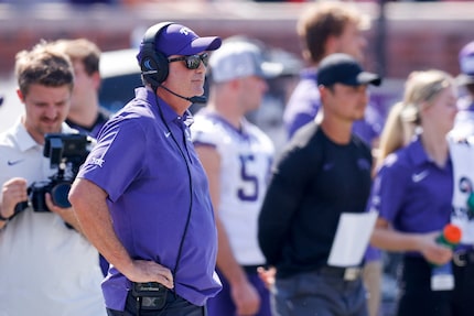 TCU head coach Sonny Dykes stands along the sideline before a game against SMU at Ford...