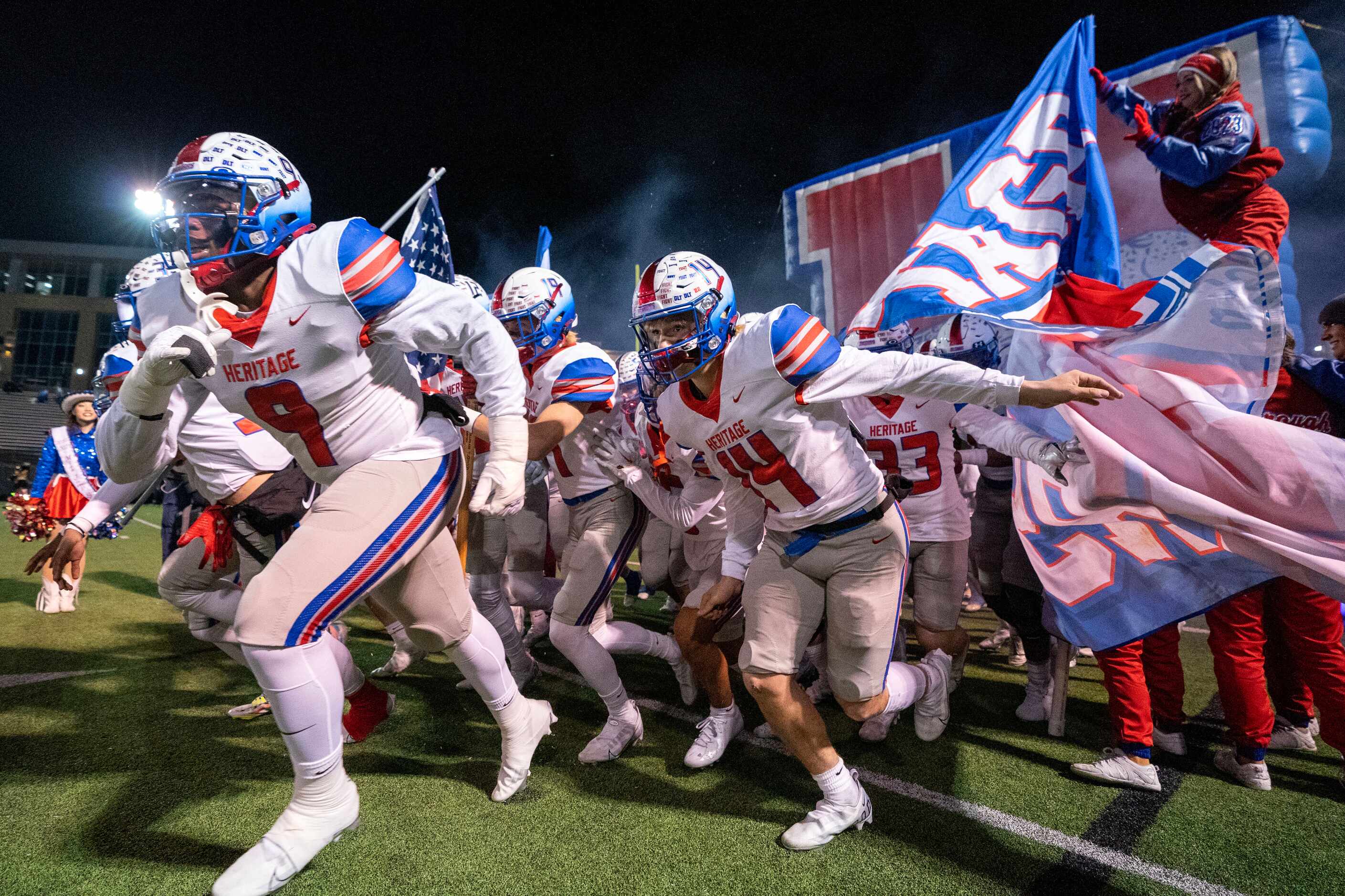 Midlothian Heritage takes the field before a high school football game against Crandall on...
