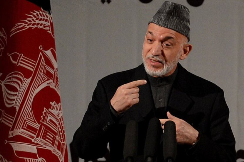 Afghan President Hamid Karzai speaks at a gathering of women to mark International Women's...