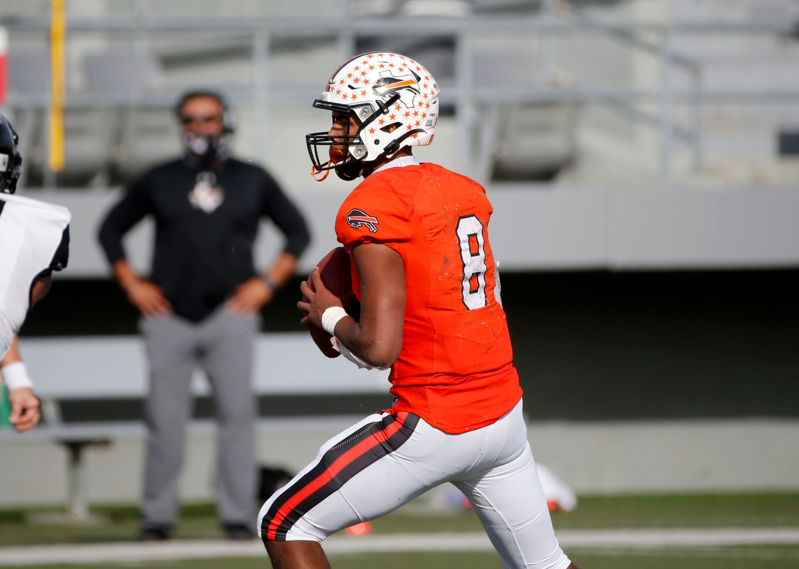 Haltom quarterback Jace Washington (8) looks to throw against Euless Trinity during their...