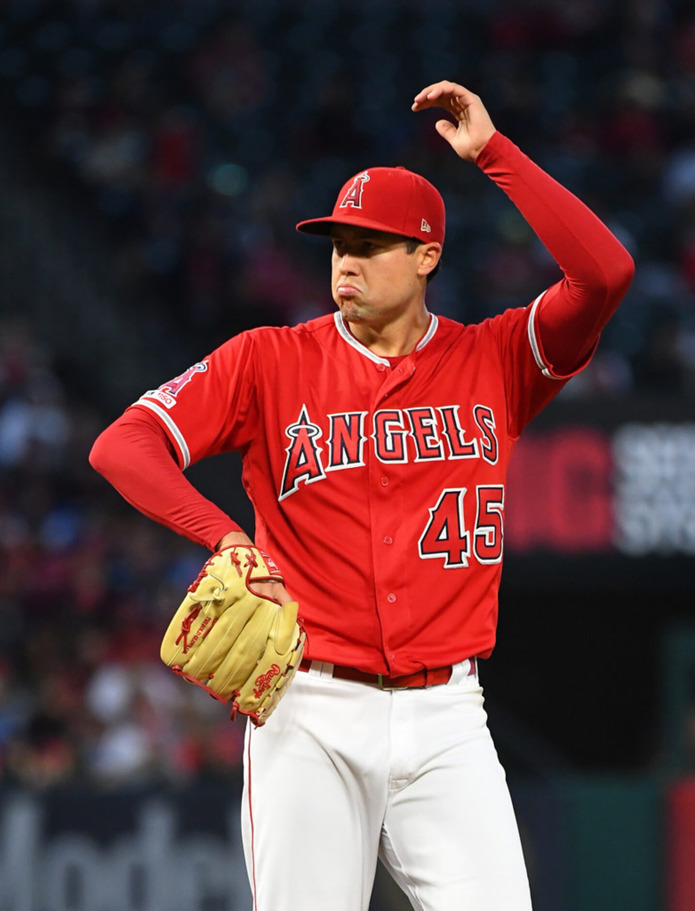 ANAHEIM, CA - MAY 25: Tyler Skaggs #45 of the Los Angeles Angels of Anaheim grimaces after...