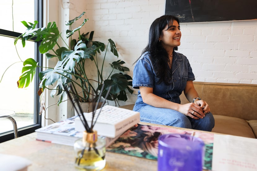 Victoria Leiato, owner of Bloom Space, sits on a couch in her shop Wednesday, Oct. 25, 2023,...