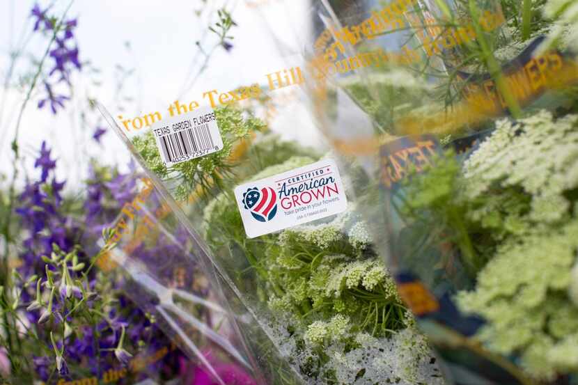 About 80 percent  of cut flowers are imported. This label identifies local blooms.
