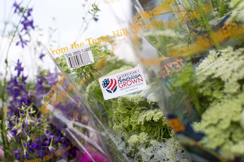 About 80 percent  of cut flowers are imported. This label identifies local blooms.