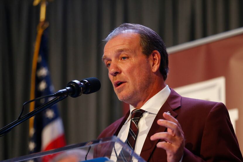 Texas A&M's new coach Jimbo Fisher gives a speech during a press conference at Kyle Field in...