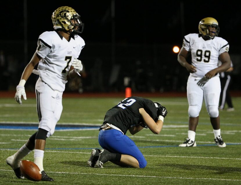 Hebron receiver Mark Scott (32) reacts after he is unable to make a reception on a reverse...