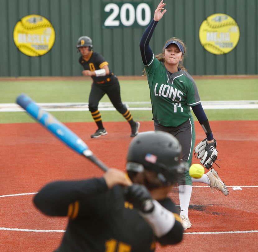 Frisco Reedy pitcher Micaela Wark (14) delivers a pitch to a Denison batter during the...