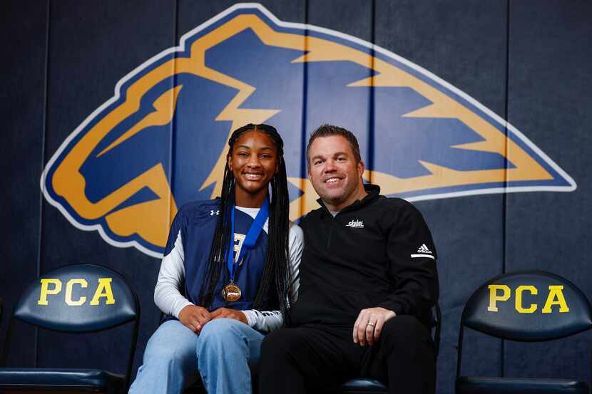 Plano Prestonwood sophomore outside hitter Macaria Spears, left, and her coach Ryan Mitchell...