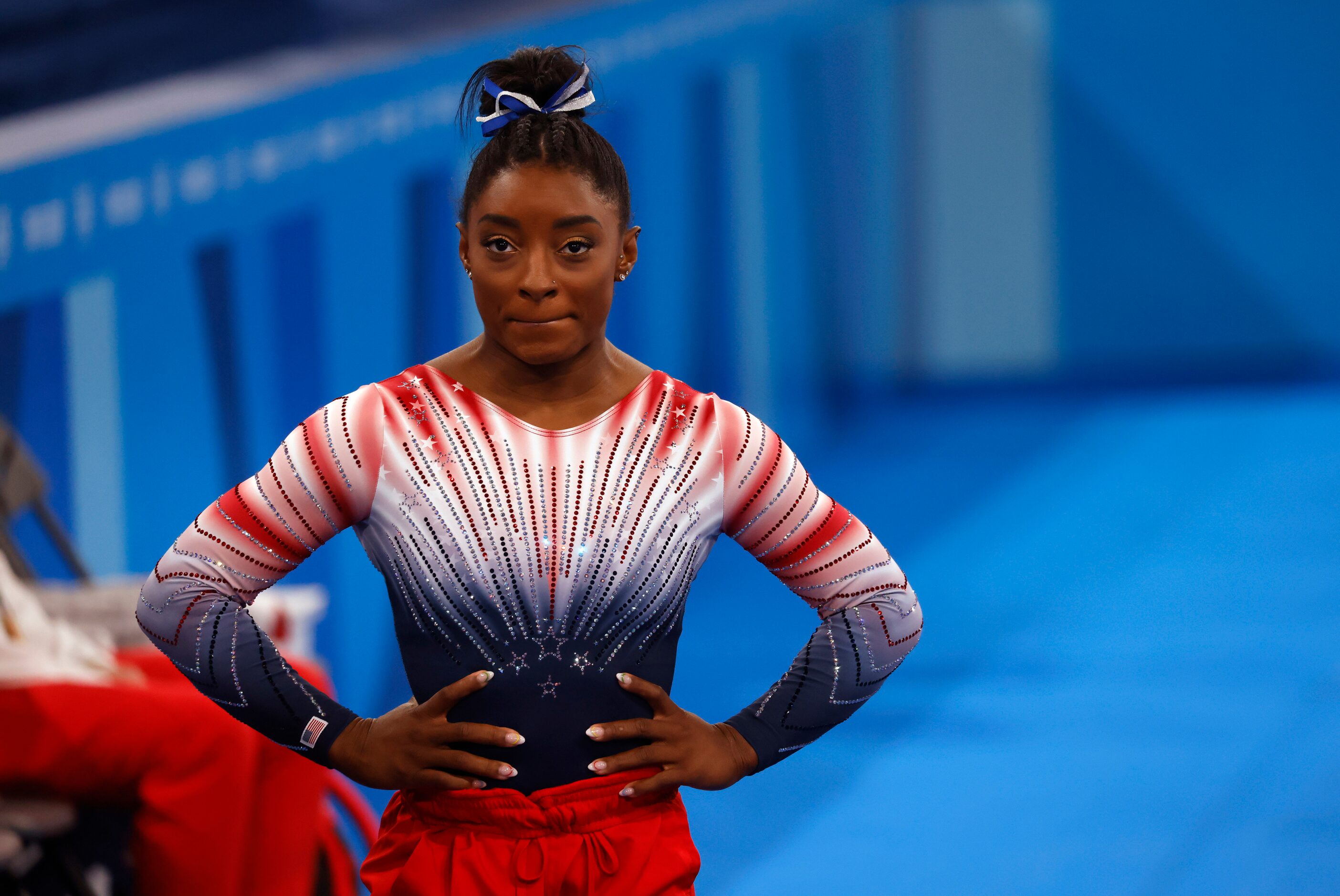 USA’s Simone Biles before competing in the women’s balance beam final at the postponed 2020...