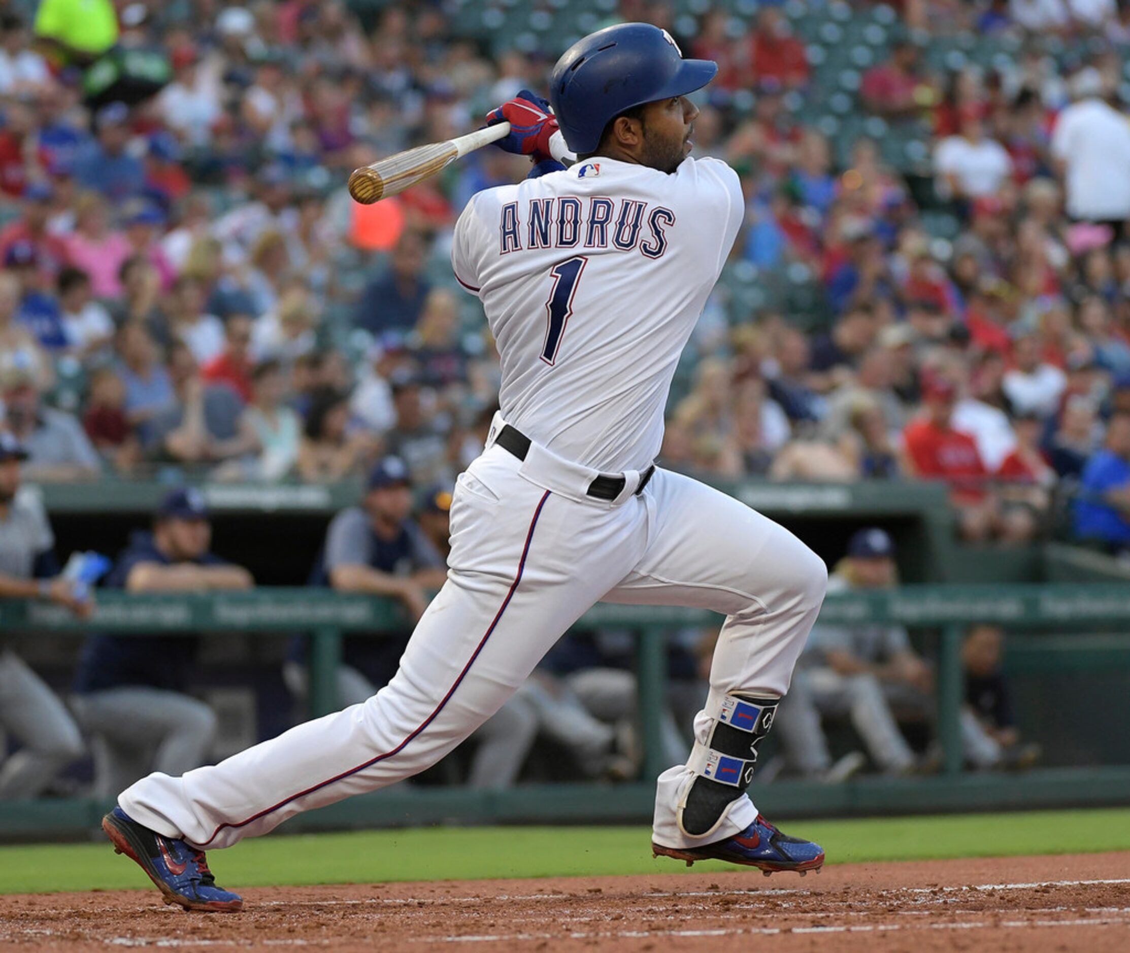 Texas Rangers shortstop Elvis Andrus (1) flies out to right field during the third inning as...