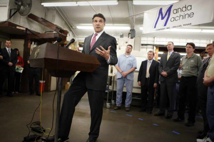 Gov. Rick Perry paid a visit Tuesday to Manda Machine Co. in Dallas. He spoke against...