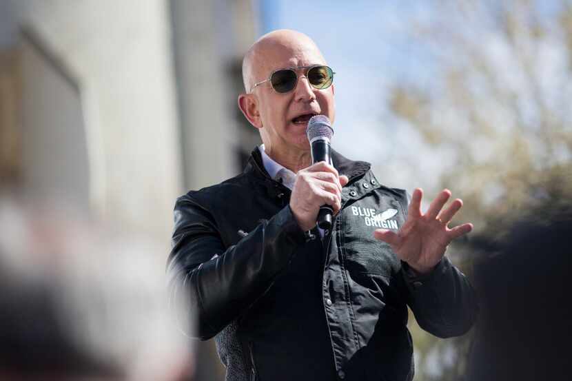 FILE â Jeff Bezos, the founder of Amazon, discusses his Blue Origin reusable rocket...
