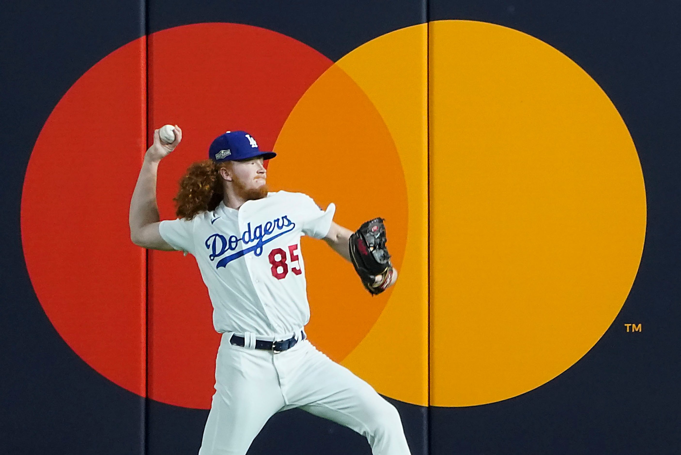 Los Angeles Dodgers starting pitcher Dustin May warms up before Game 7 of a National League...