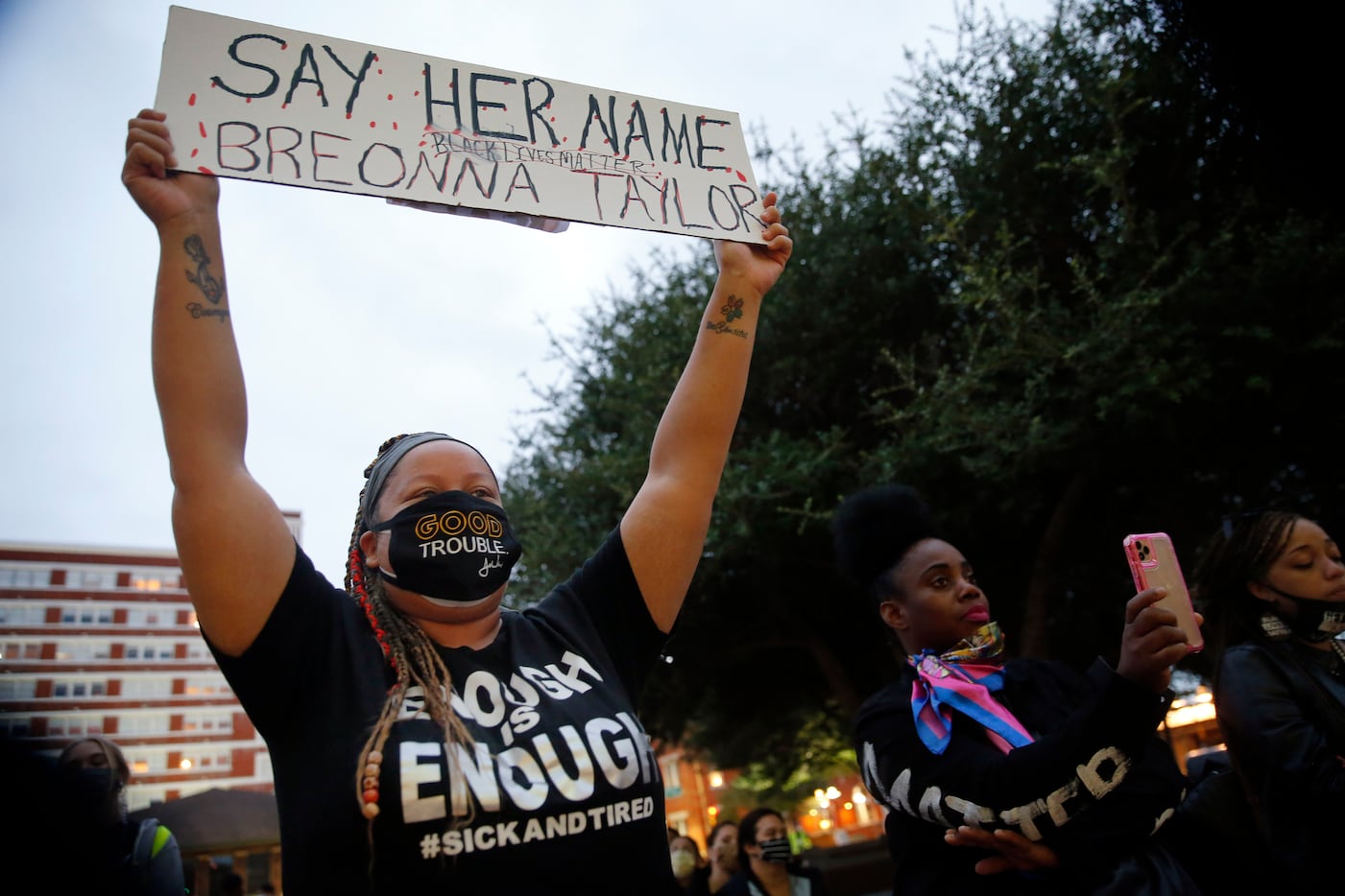 Shena Lee of Dallas proudly held her sign high in support of Breonna Taylor during a Next...