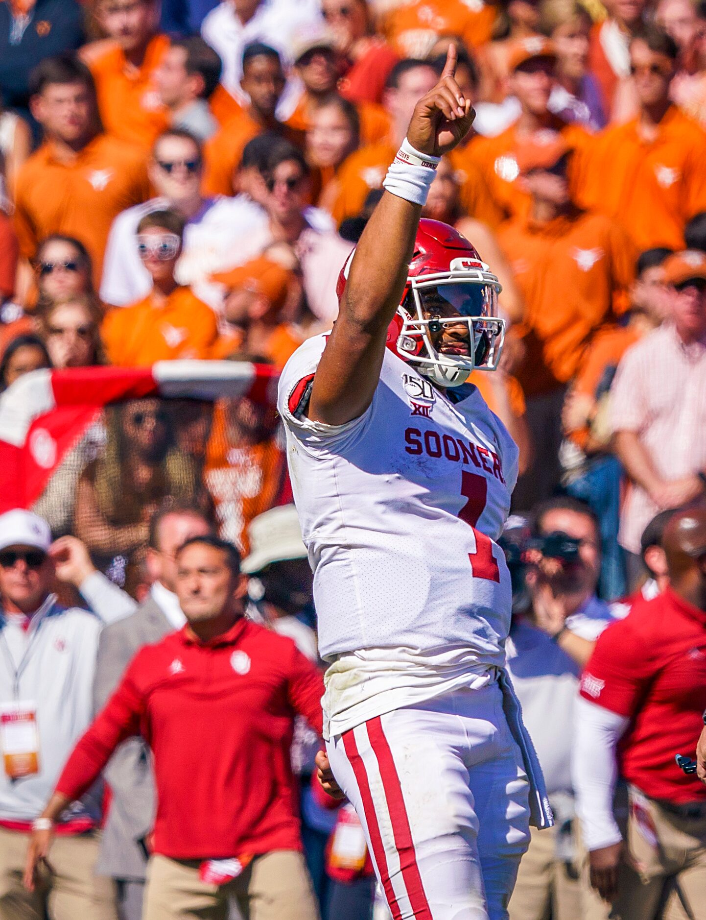 Oklahoma quarterback Jalen Hurts (1) celebrates as time expires on a victory over Texas in...