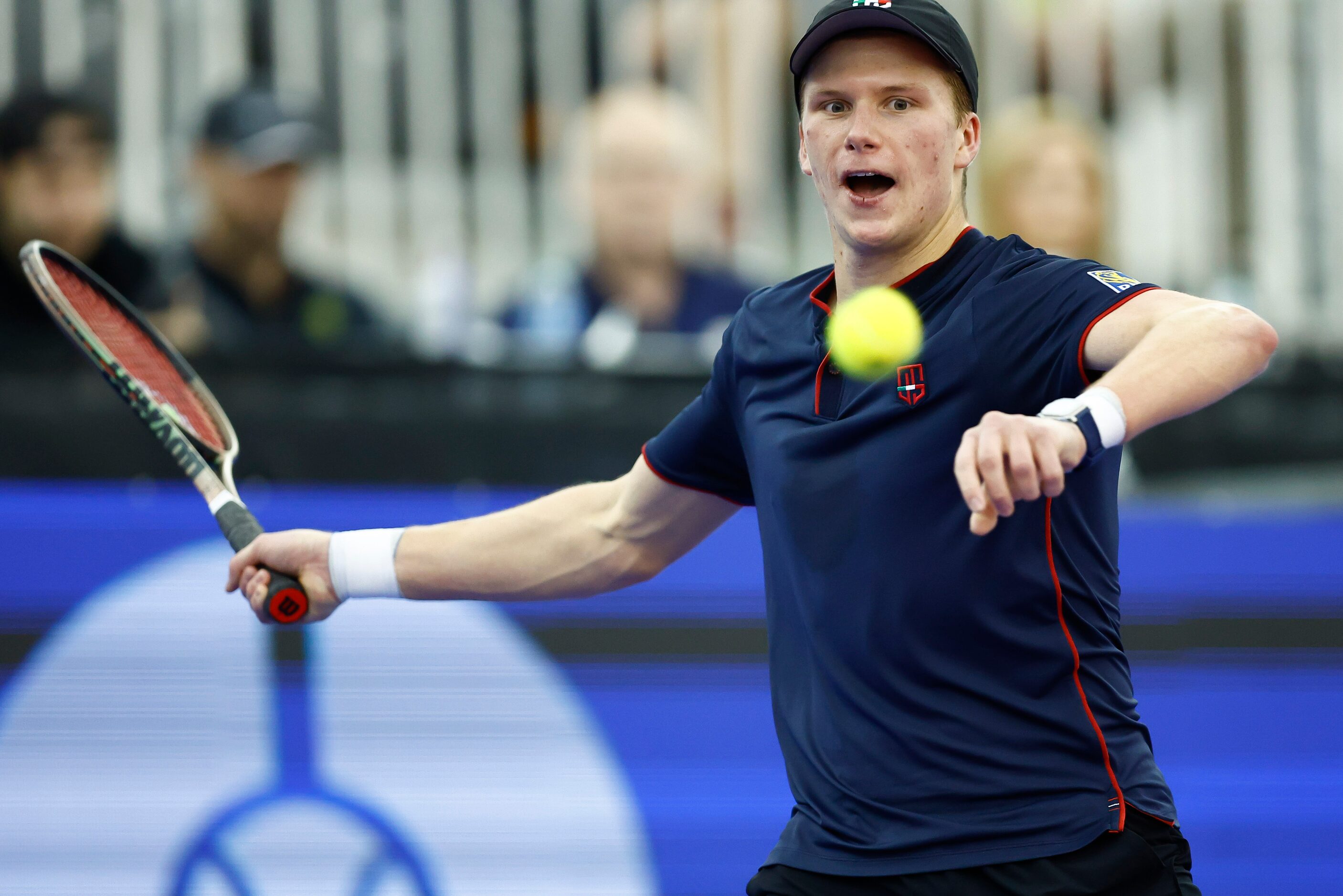 Jenson Brooksby returns the ball during the finals of the ATP Dallas Open against Reilly...