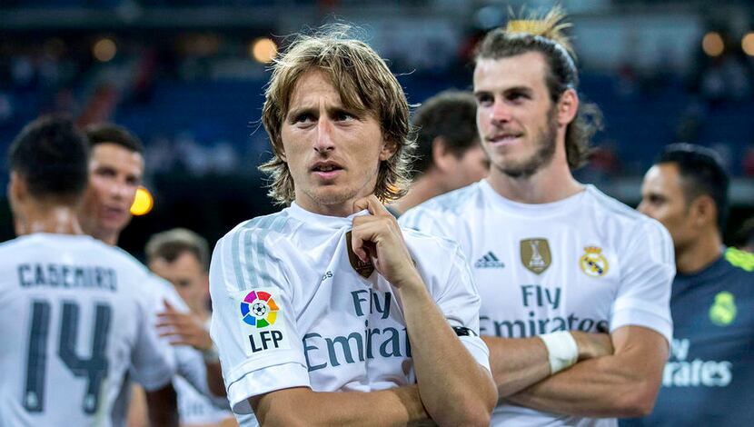 MADRID, SPAIN - AUGUST 18: Luka Modric (L) of Real Madrid CF looks on close to his teammate...