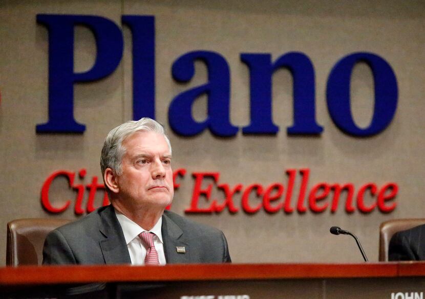 Plano Mayor John Muns listens to residents speak against short-term rentals at the Plano...